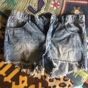 Free People distressed faded denim shorts